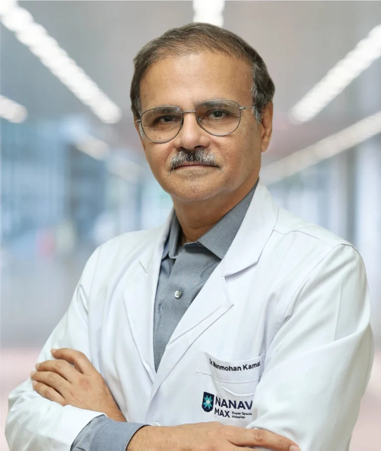 Dr. Manmohan M. Kamat
